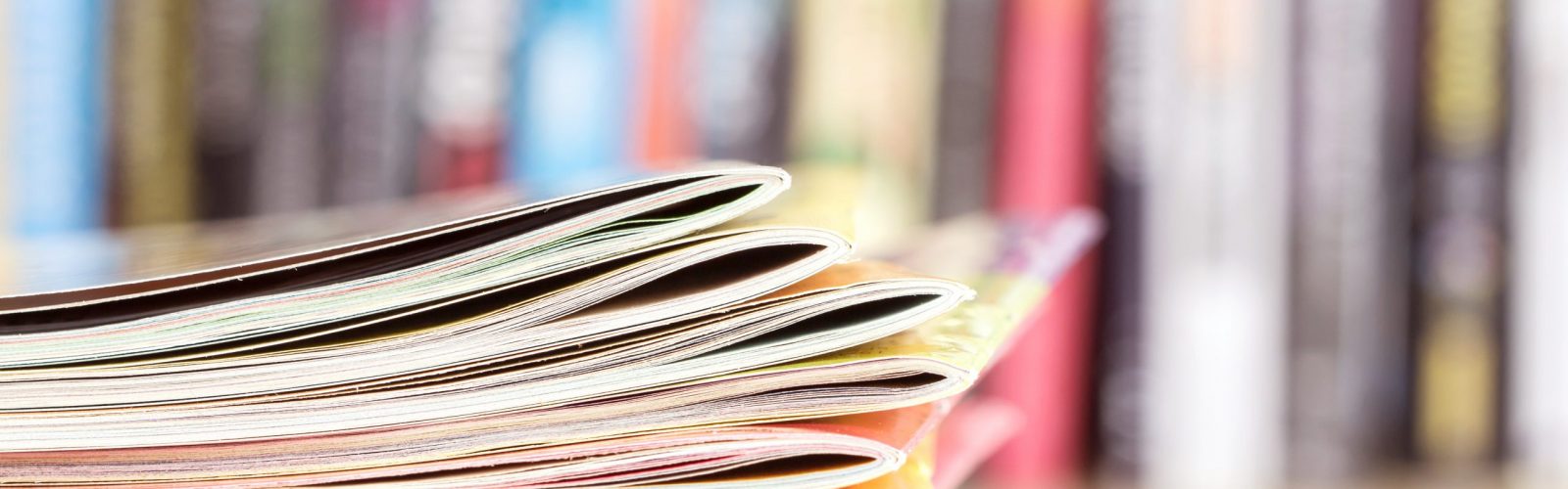 Stacks of journals on desk